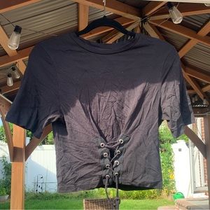 Revamped black crop top with lacing detail on the front